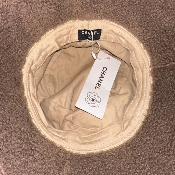 CHANEL Cream and Brown Designer Winter Bucket Hat with Gold Logo
